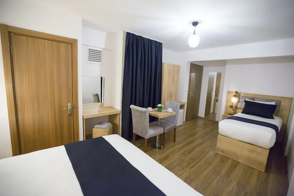 Economy Tek Büyük veya İki Ayrı Yataklı Oda