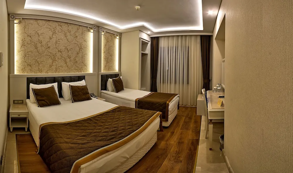 Deluxe Üç Kişilik Oda