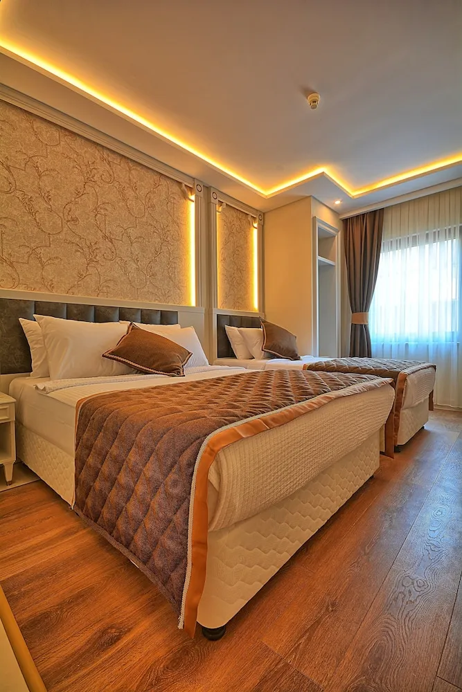 Deluxe Üç Kişilik Oda