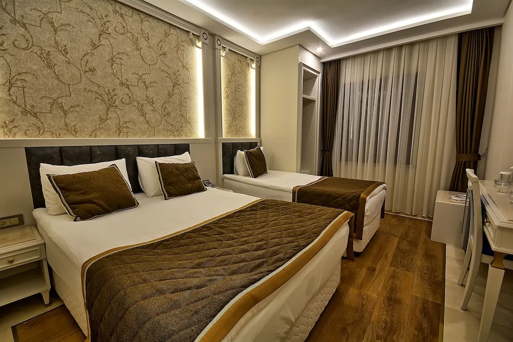 Deluxe Üç Kişilik Oda