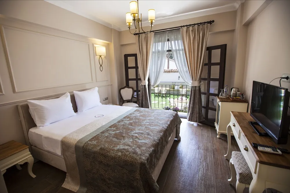 Deluxe Tek Büyük veya İki Ayrı Yataklı Oda