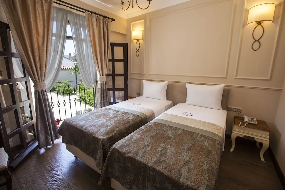 Deluxe Tek Büyük veya İki Ayrı Yataklı Oda