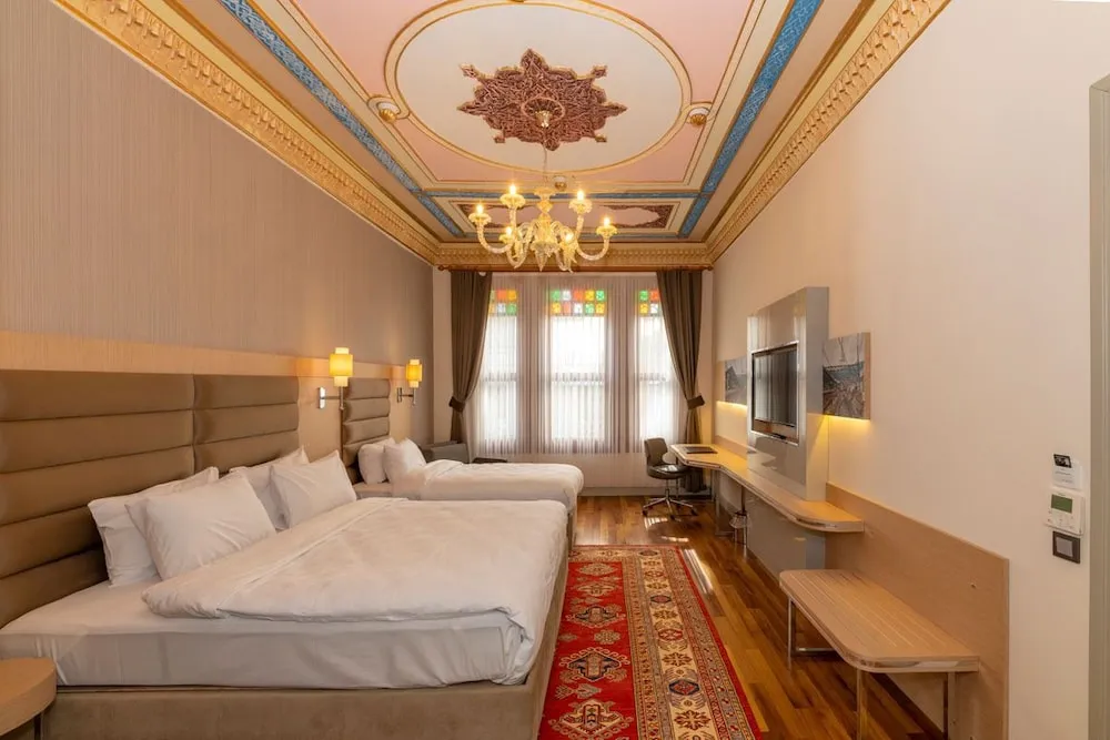 Deluxe Üç Kişilik Oda
