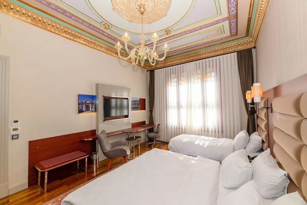 Deluxe Üç Kişilik Oda
