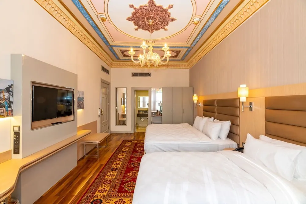 Deluxe Üç Kişilik Oda