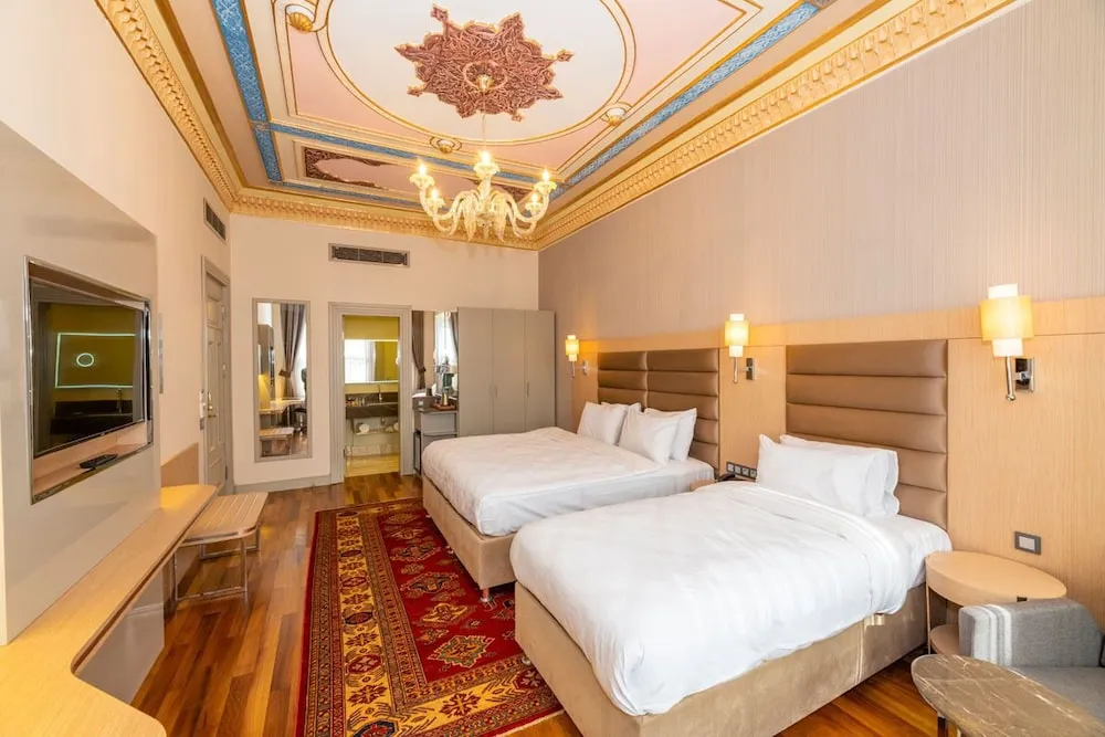Deluxe Üç Kişilik Oda