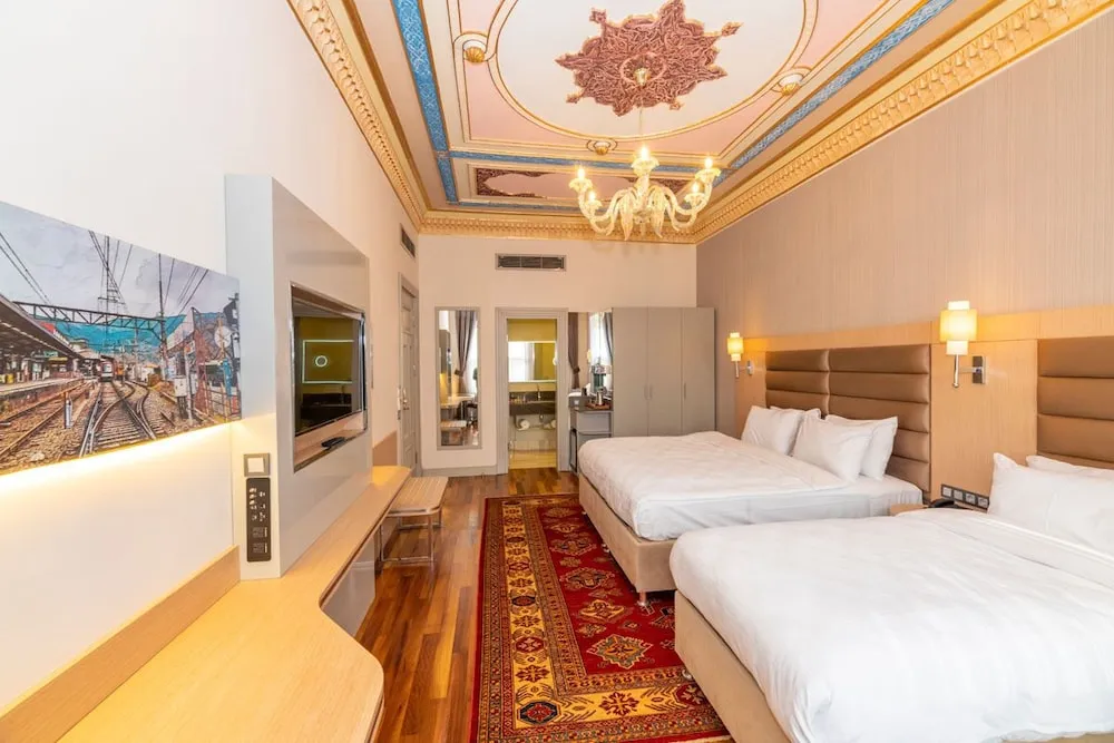Deluxe Üç Kişilik Oda