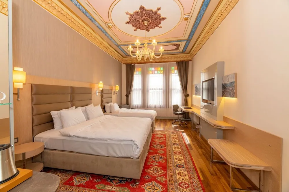 Deluxe Üç Kişilik Oda