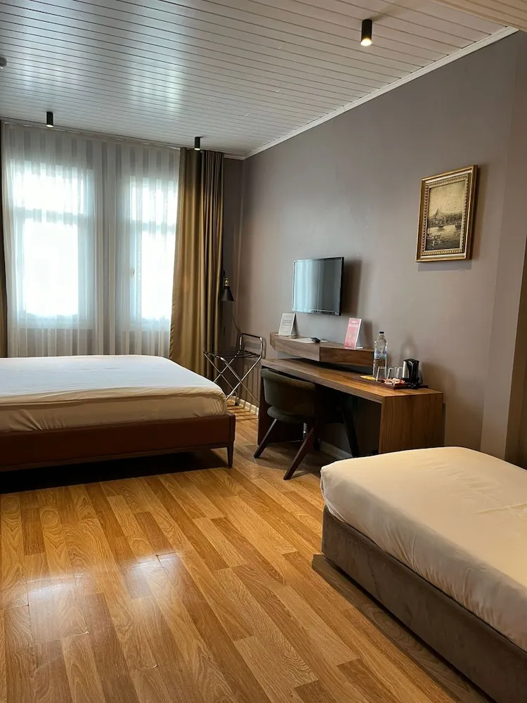 Premium Üç Kişilik Oda
