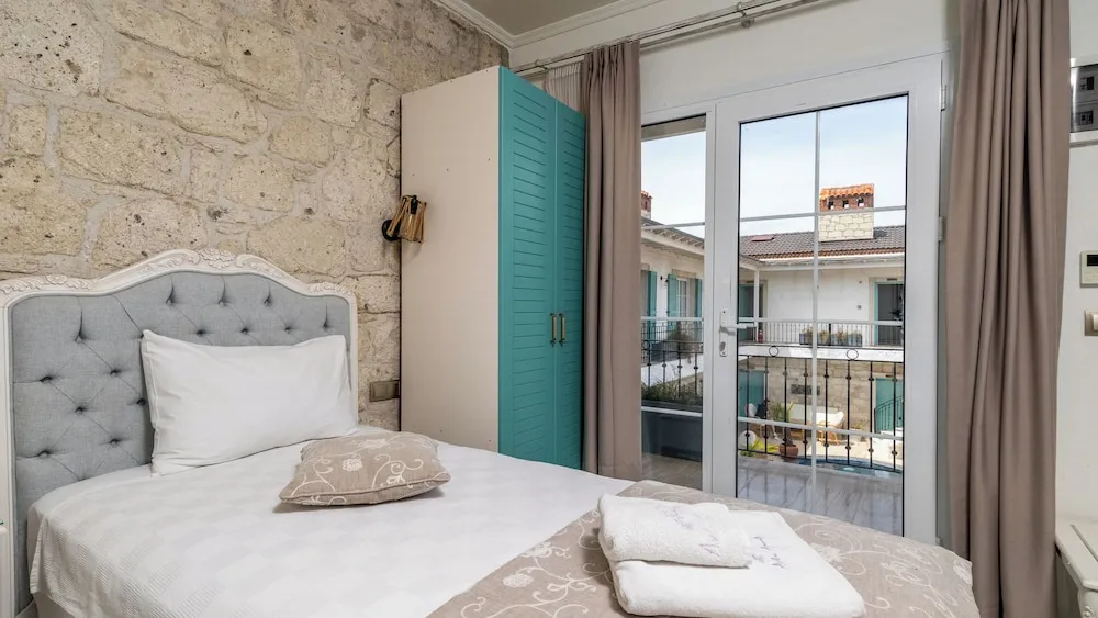 Deluxe Dört Kişilik Oda