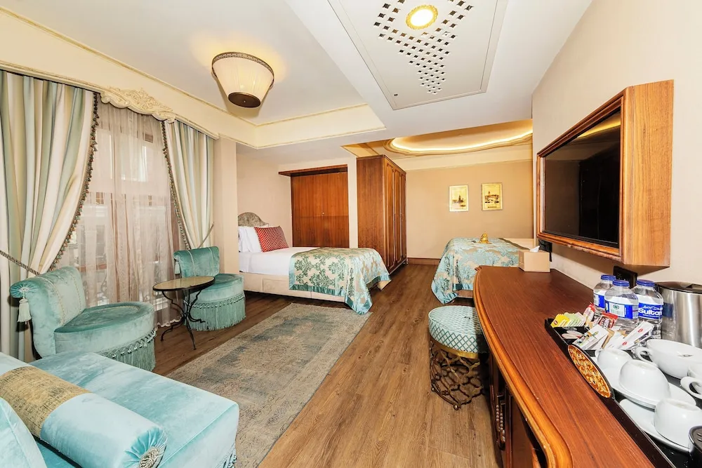 Deluxe Üç Kişilik Oda