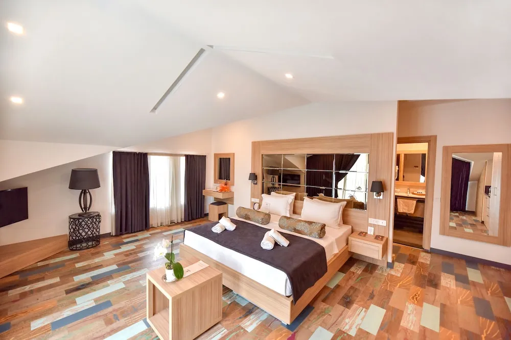 Deluxe Tek Büyük veya İki Ayrı Yataklı Oda