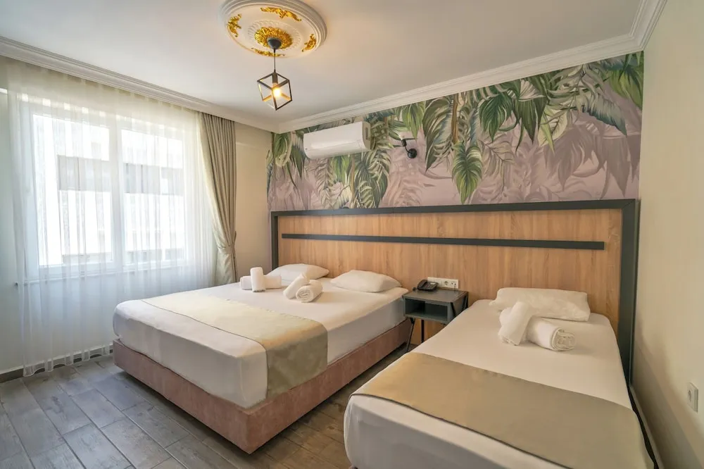 Deluxe Üç Kişilik Oda