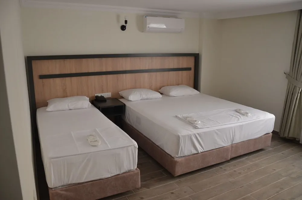 Deluxe Üç Kişilik Oda