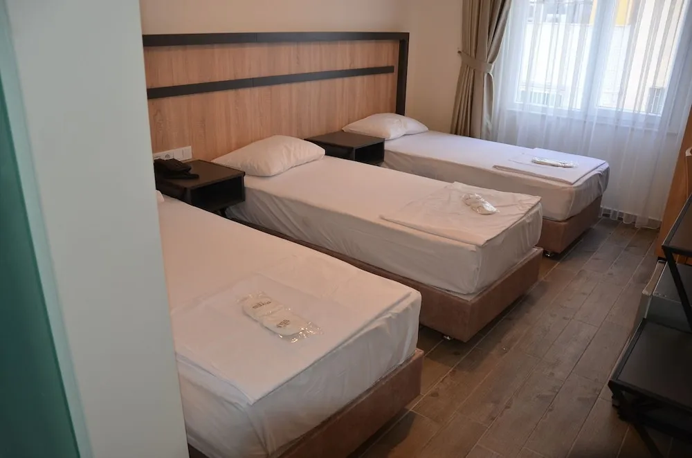 Deluxe Üç Kişilik Oda