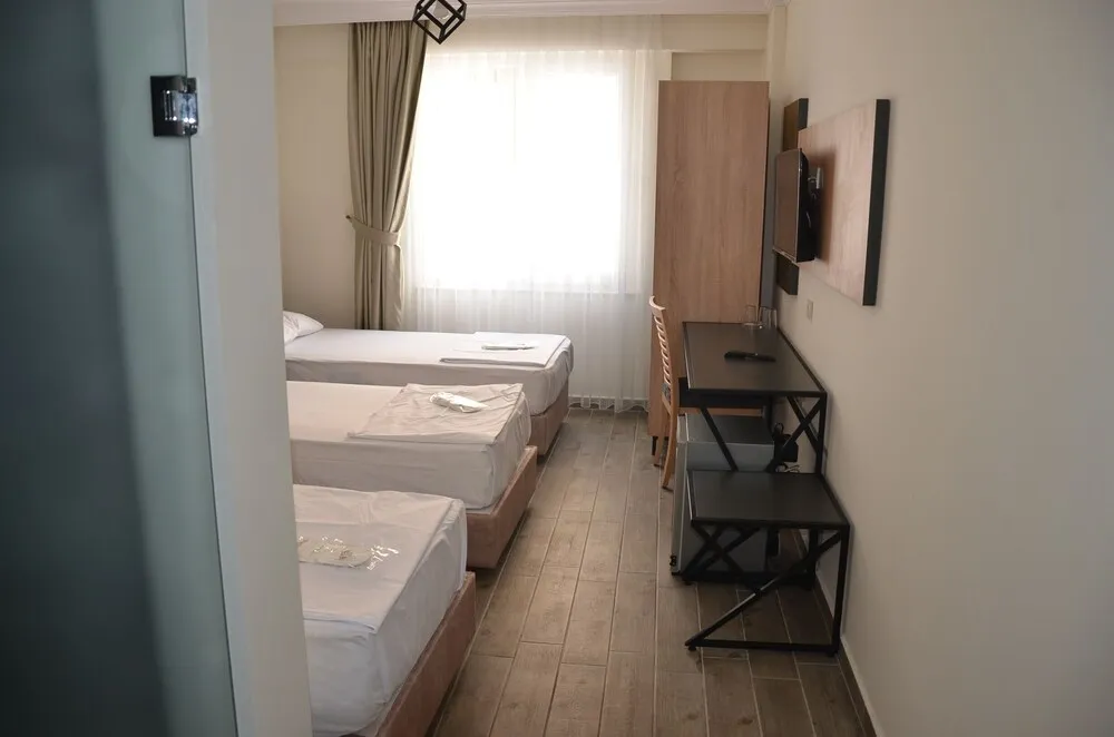 Deluxe Üç Kişilik Oda