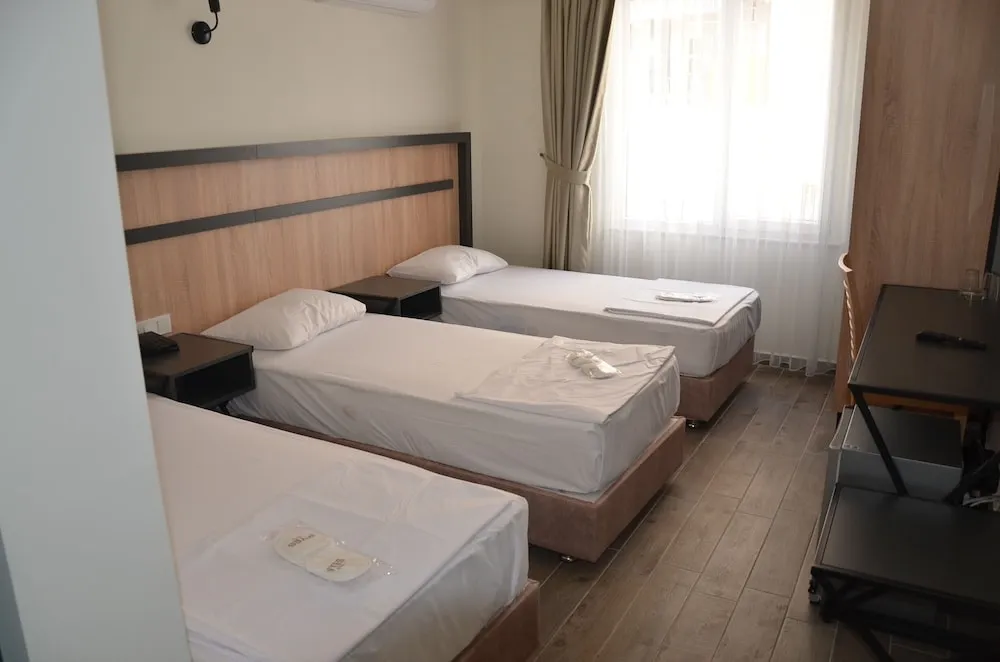 Deluxe Üç Kişilik Oda