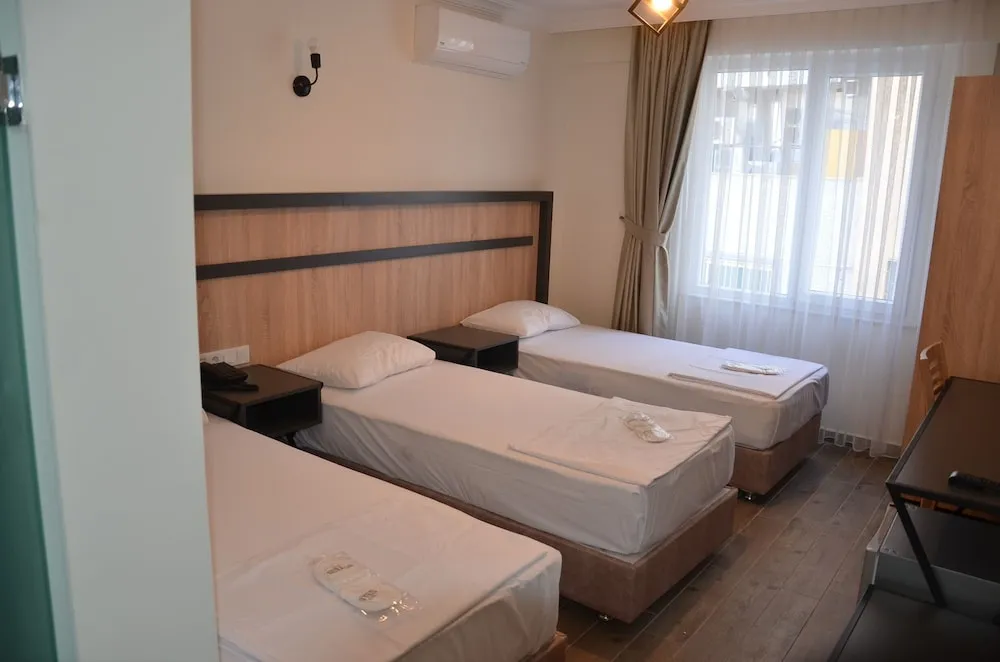 Deluxe Üç Kişilik Oda