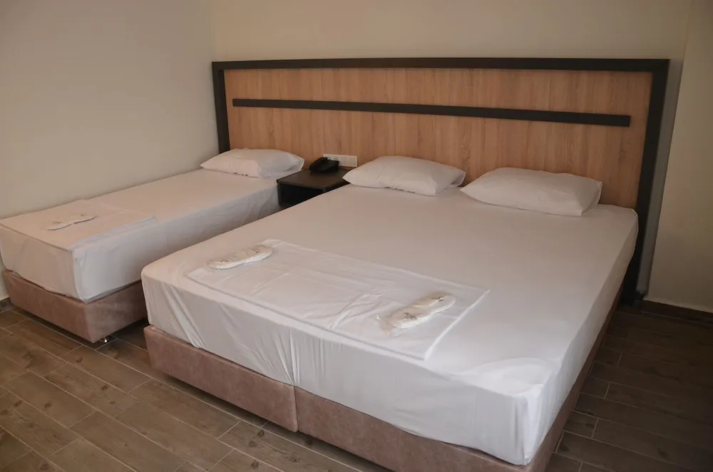 Deluxe Üç Kişilik Oda