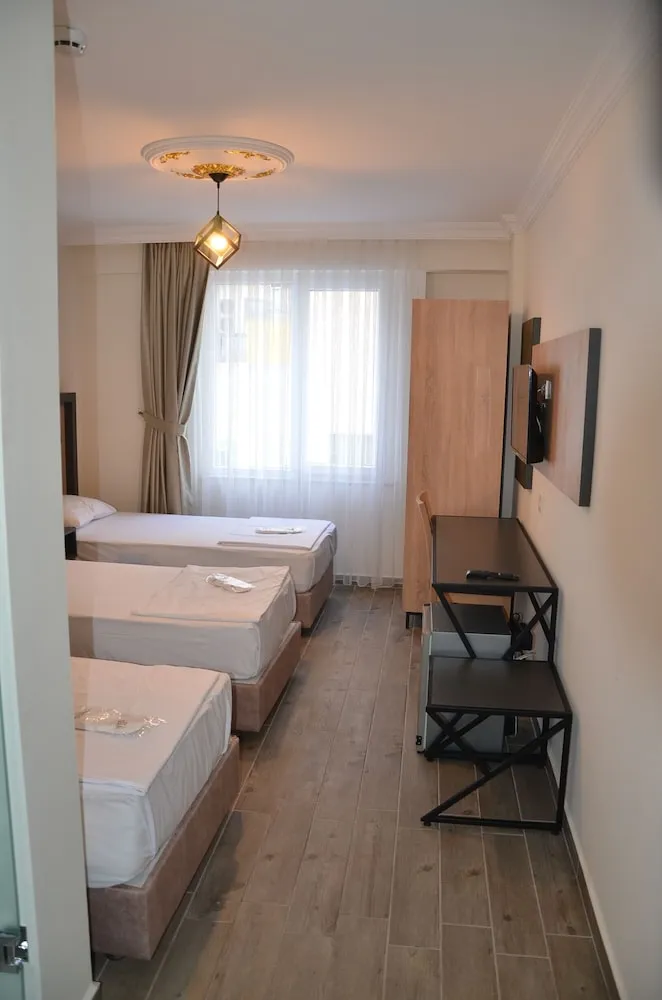 Deluxe Üç Kişilik Oda