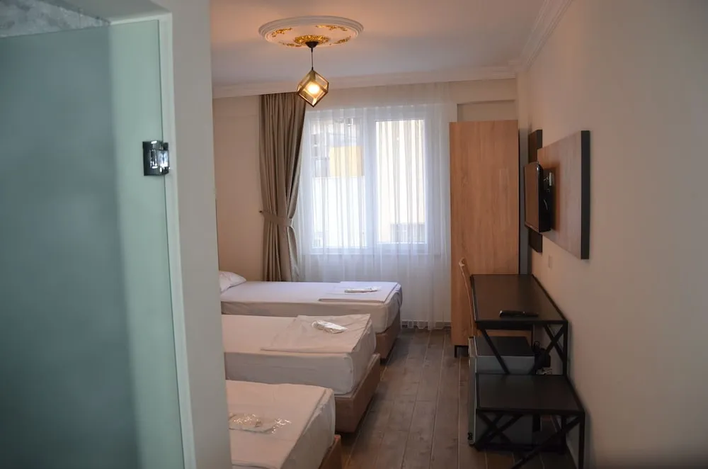 Deluxe Üç Kişilik Oda