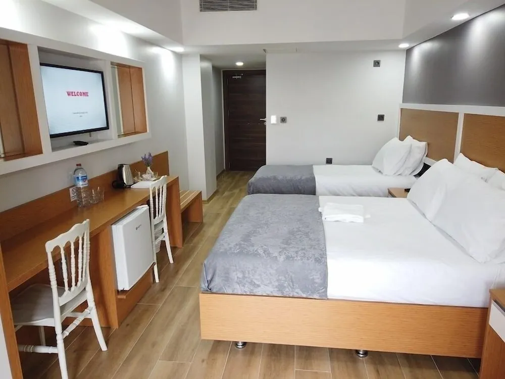 Deluxe Tek Büyük veya İki Ayrı Yataklı Oda