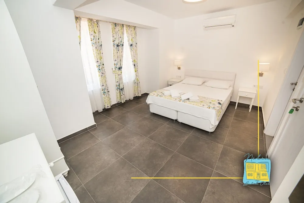 Standard Üç Kişilik Oda, Bahçe Manzaralı