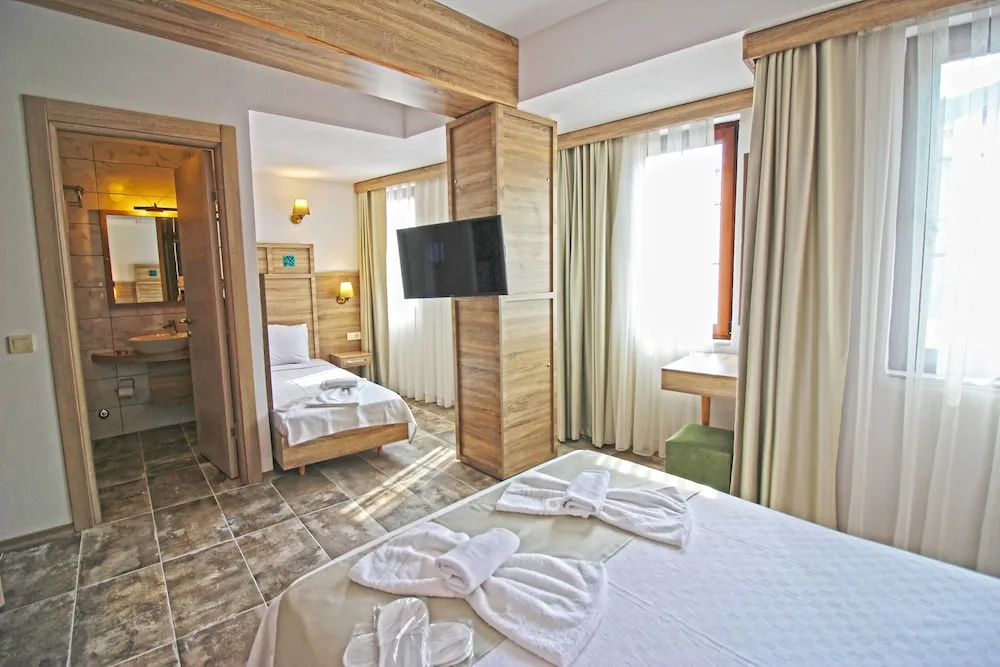 Deluxe Üç Kişilik Oda