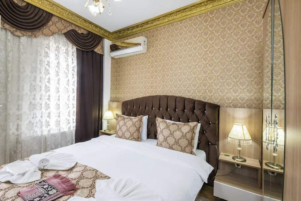 Deluxe Tek Büyük veya İki Ayrı Yataklı Oda