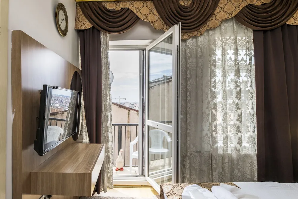 Deluxe Tek Büyük veya İki Ayrı Yataklı Oda