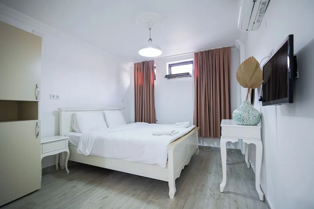 Economy Üç Kişilik Oda