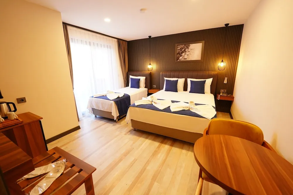 Deluxe Tek Büyük veya İki Ayrı Yataklı Oda