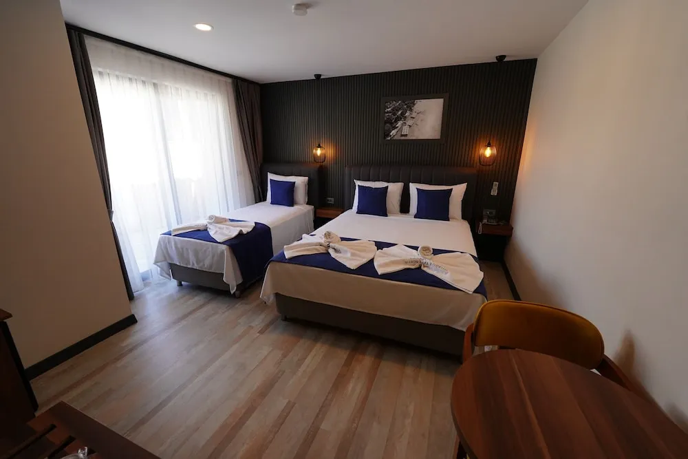 Family Üç Kişilik Oda