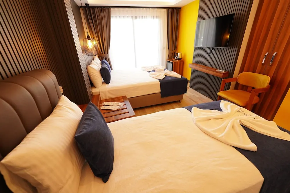 Family Üç Kişilik Oda