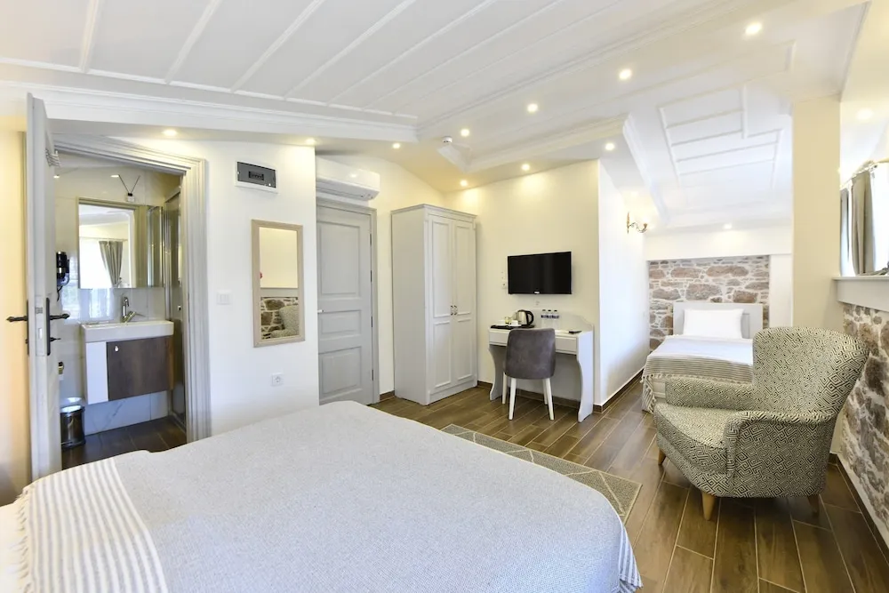 Deluxe Üç Kişilik Oda