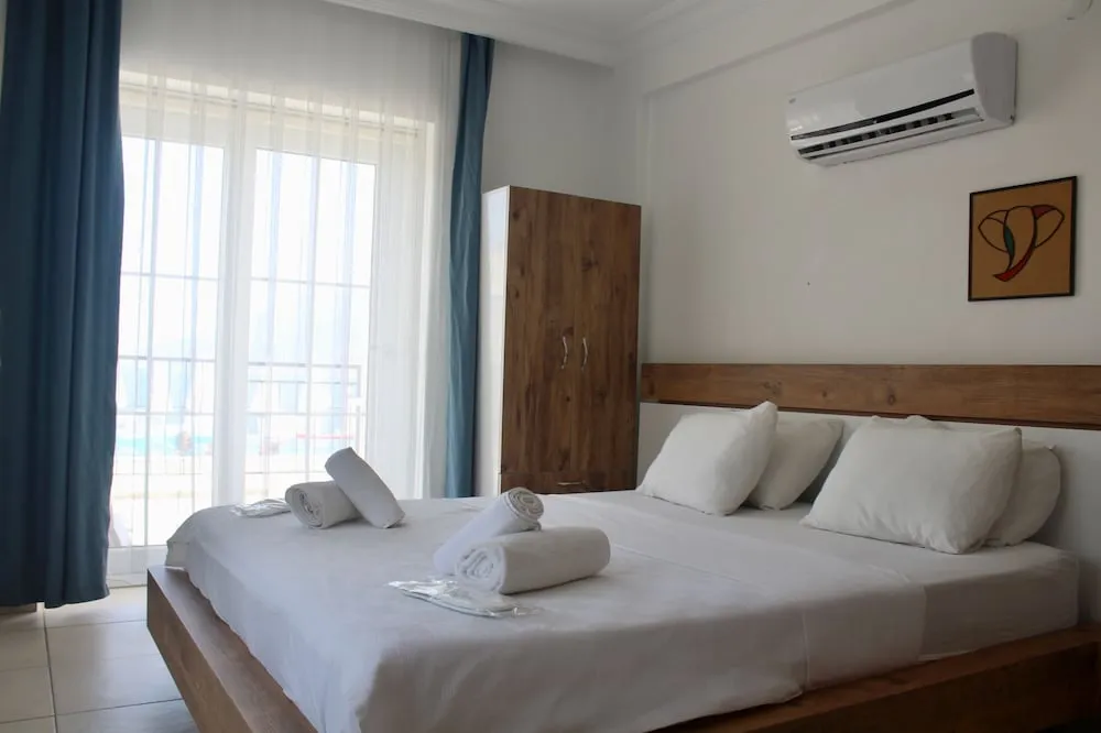 Deluxe Üç Kişilik Oda, Küvet, Deniz Manzaralı