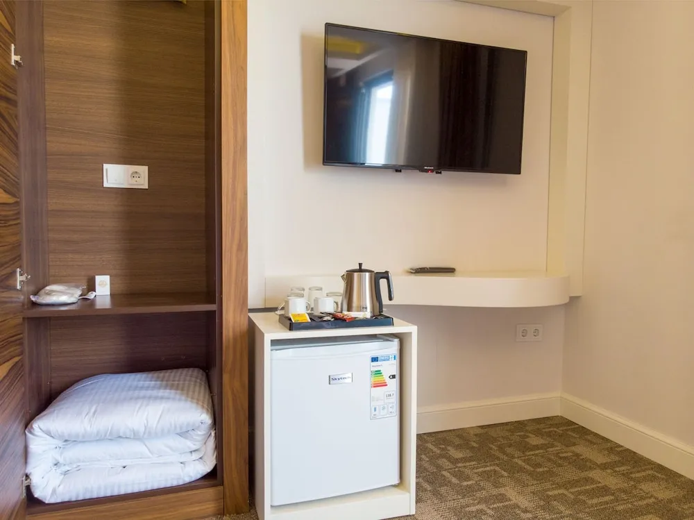 Deluxe Üç Kişilik Oda