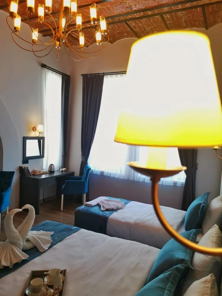 Deluxe Üç Kişilik Oda