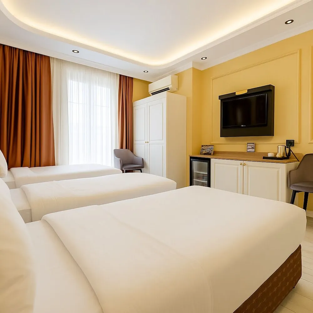 Deluxe Üç Kişilik Oda
