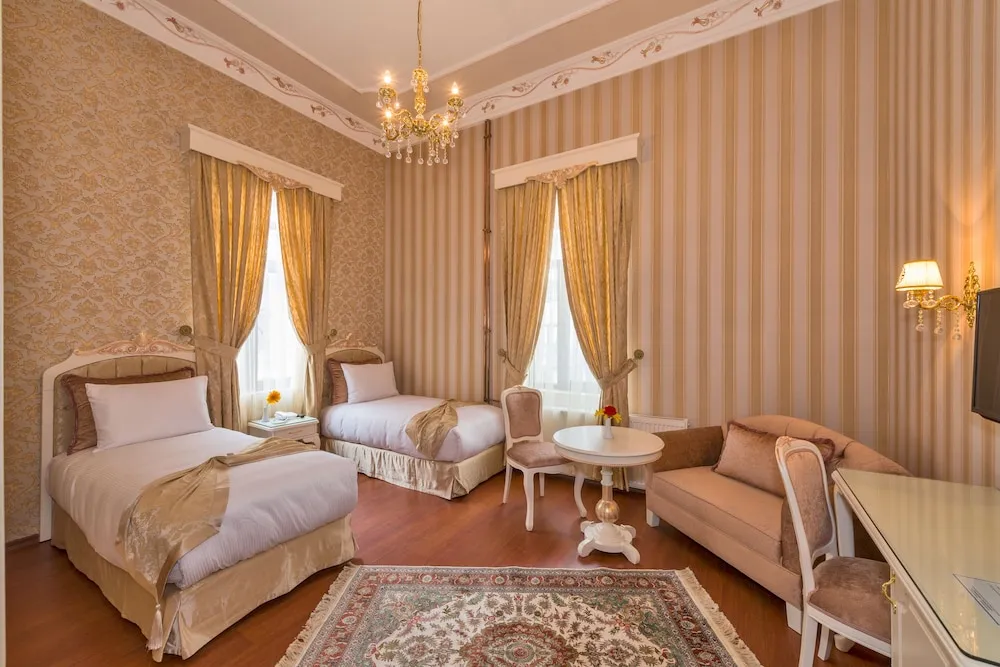 Deluxe Tek Büyük veya İki Ayrı Yataklı Oda