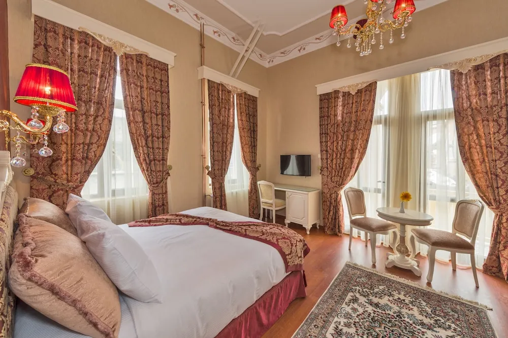 Deluxe Tek Büyük veya İki Ayrı Yataklı Oda