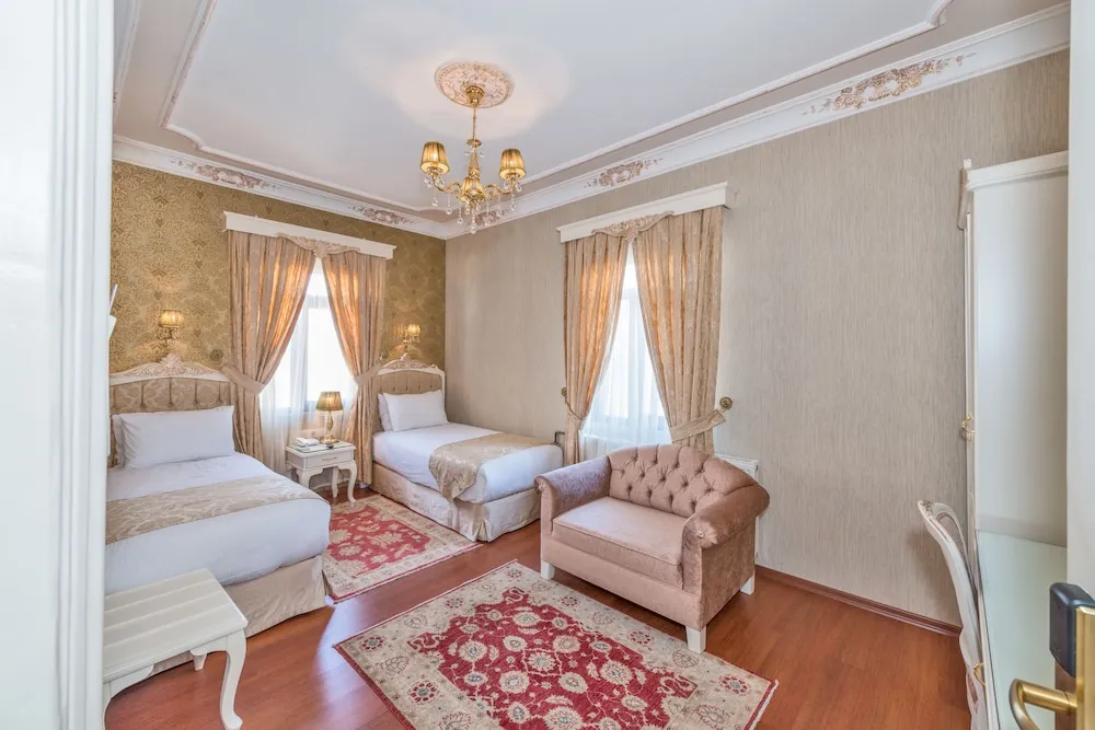Deluxe Üç Kişilik Oda