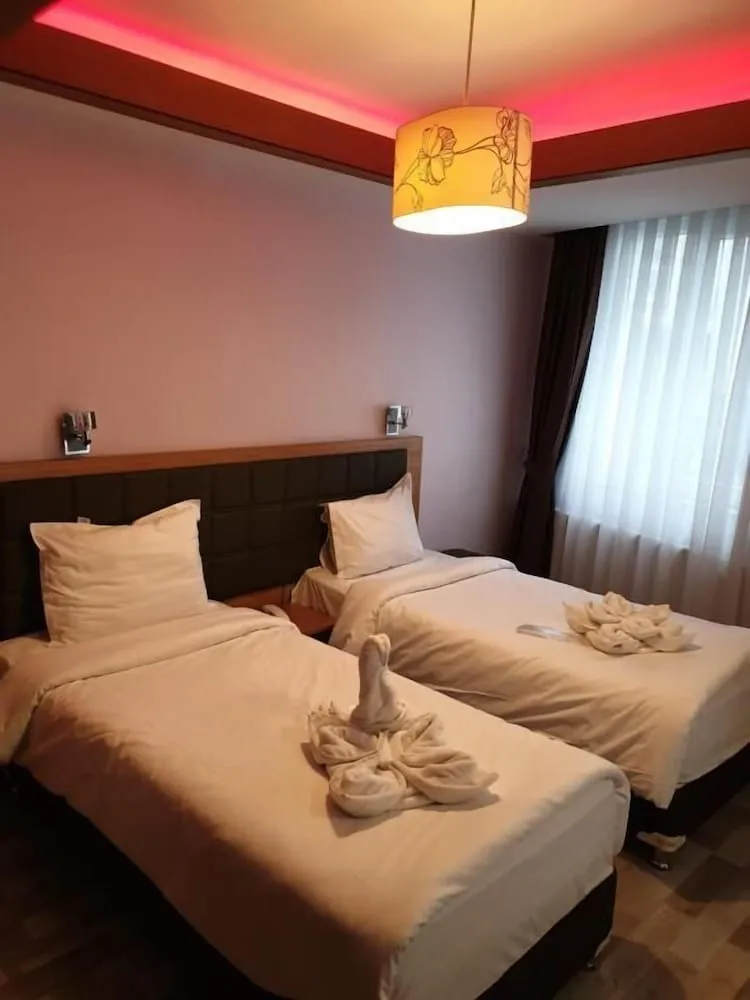Üç Kişilik Oda