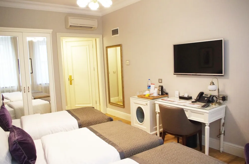 Deluxe Üç Kişilik Oda