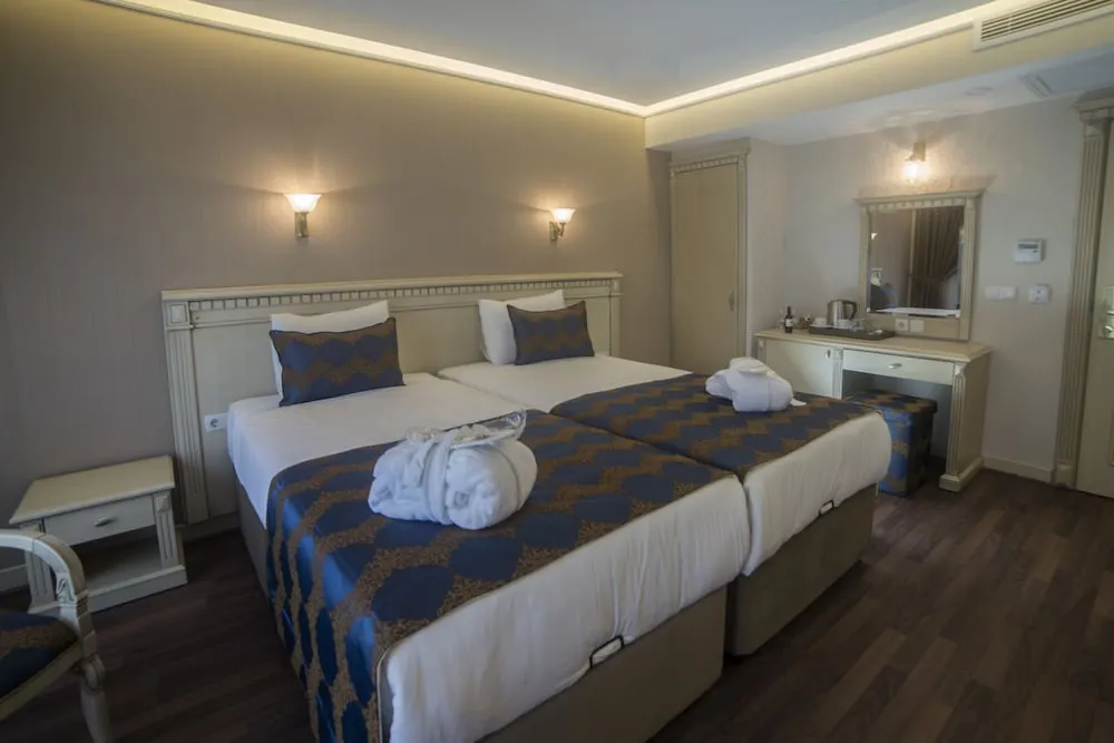 Deluxe Tek Büyük veya İki Ayrı Yataklı Oda