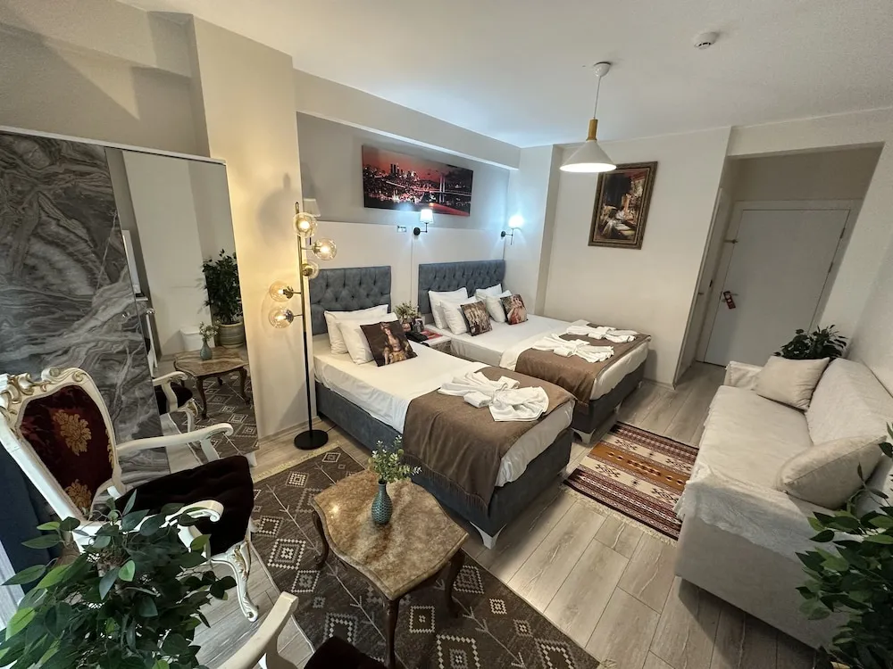 Deluxe Üç Kişilik Oda