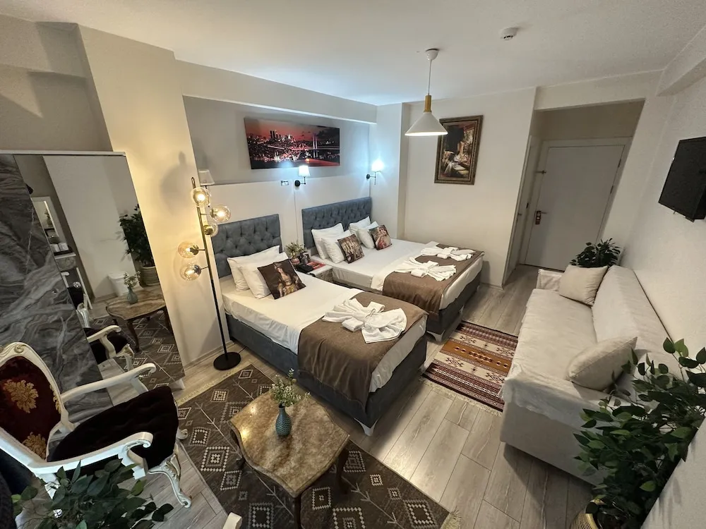Deluxe Üç Kişilik Oda