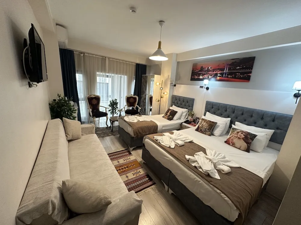 Deluxe Üç Kişilik Oda