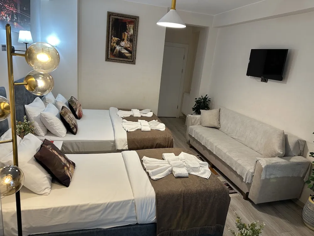 Deluxe Üç Kişilik Oda