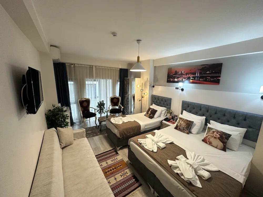 Deluxe Üç Kişilik Oda